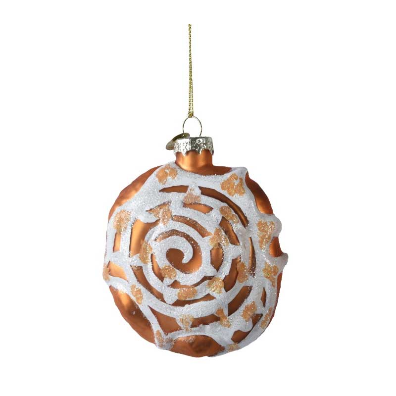 Golden glass Christmas ornament shaped like a cinnamon roll