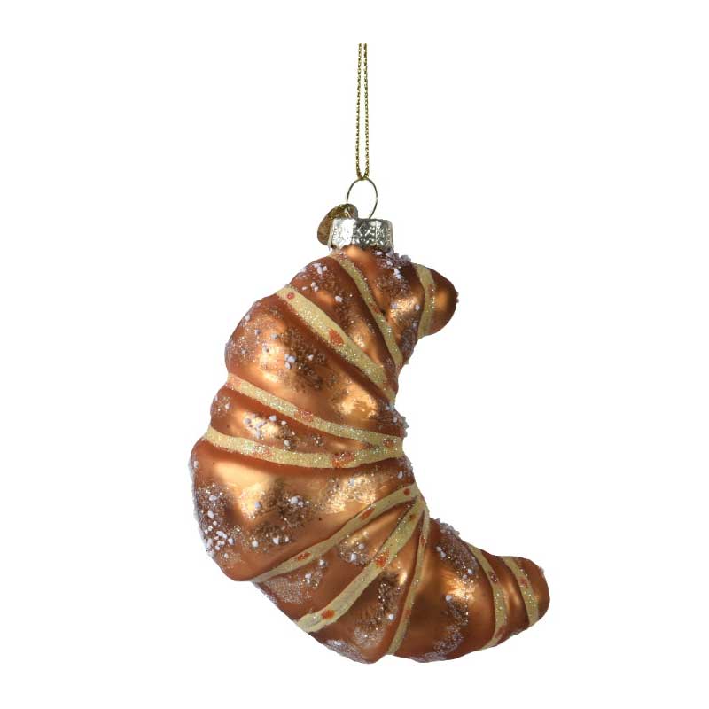 Golden glass Christmas ornament shaped like a croissant
