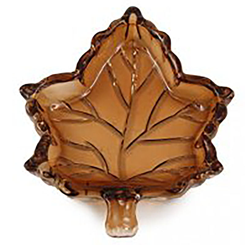 Hazel glass leaf-shaped trinket dish filled with sweets
